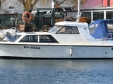 Скандинавска моторна лодка тип Pilothouse, глисираща, 6.60м на 2.35м. Двигател Volvo Penta TMD40A, 6